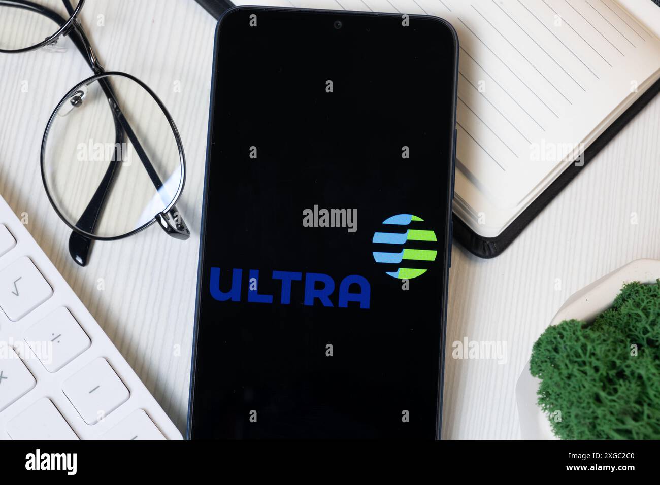 New York, USA - 11 June 2024: Ultrapar Participacoes Logo on Phone Screen, Ultra Company Icon. Stock Photo
