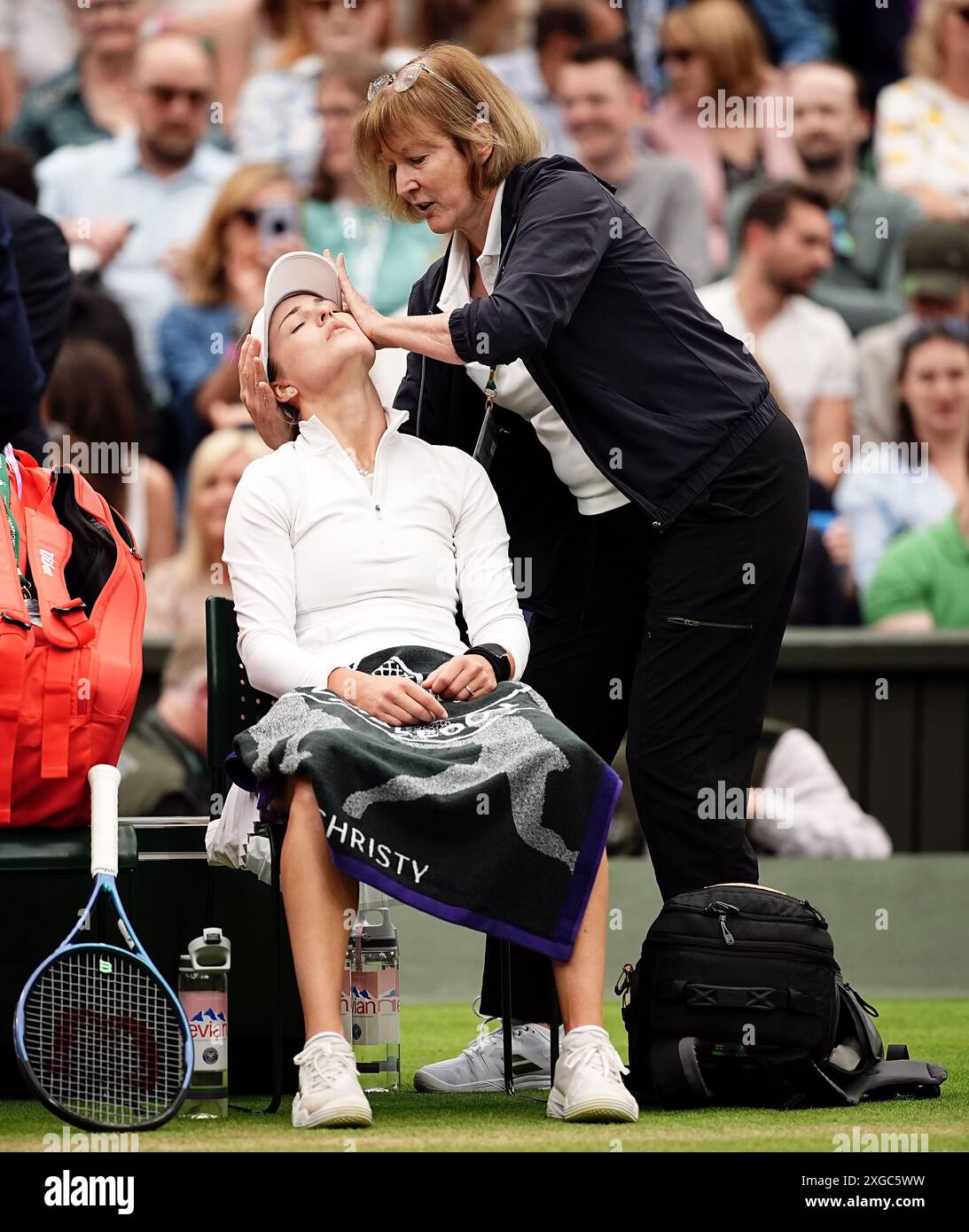 Anna Kalinskaya has a medical time out during her match against Elena
