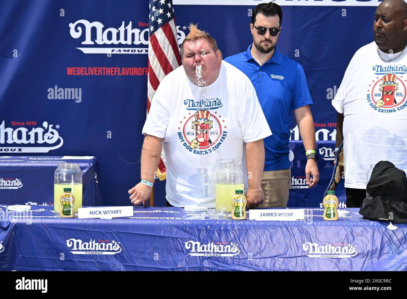 Lemonade Contest A participant throws up after competing in a Lemonade drinking contest ...