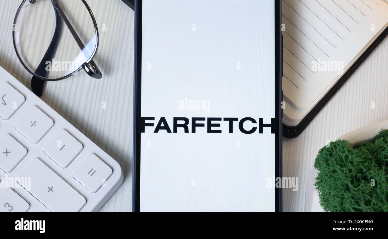 New York, USA - 11 June 2024: Farfetch Logo on Phone Screen, Company Icon. Stock Photo