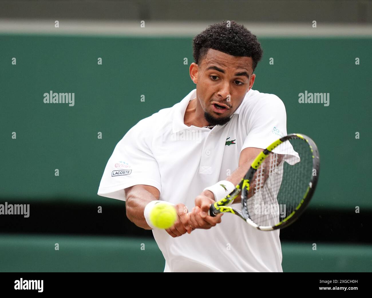 Arthur Fils in action against Alex de Minaur (not pictured) on day eight of the 2024 Wimbledon Championships at the All England Lawn Tennis and Croquet Club, London. Picture date: Monday July 8, 2024. Stock Photo