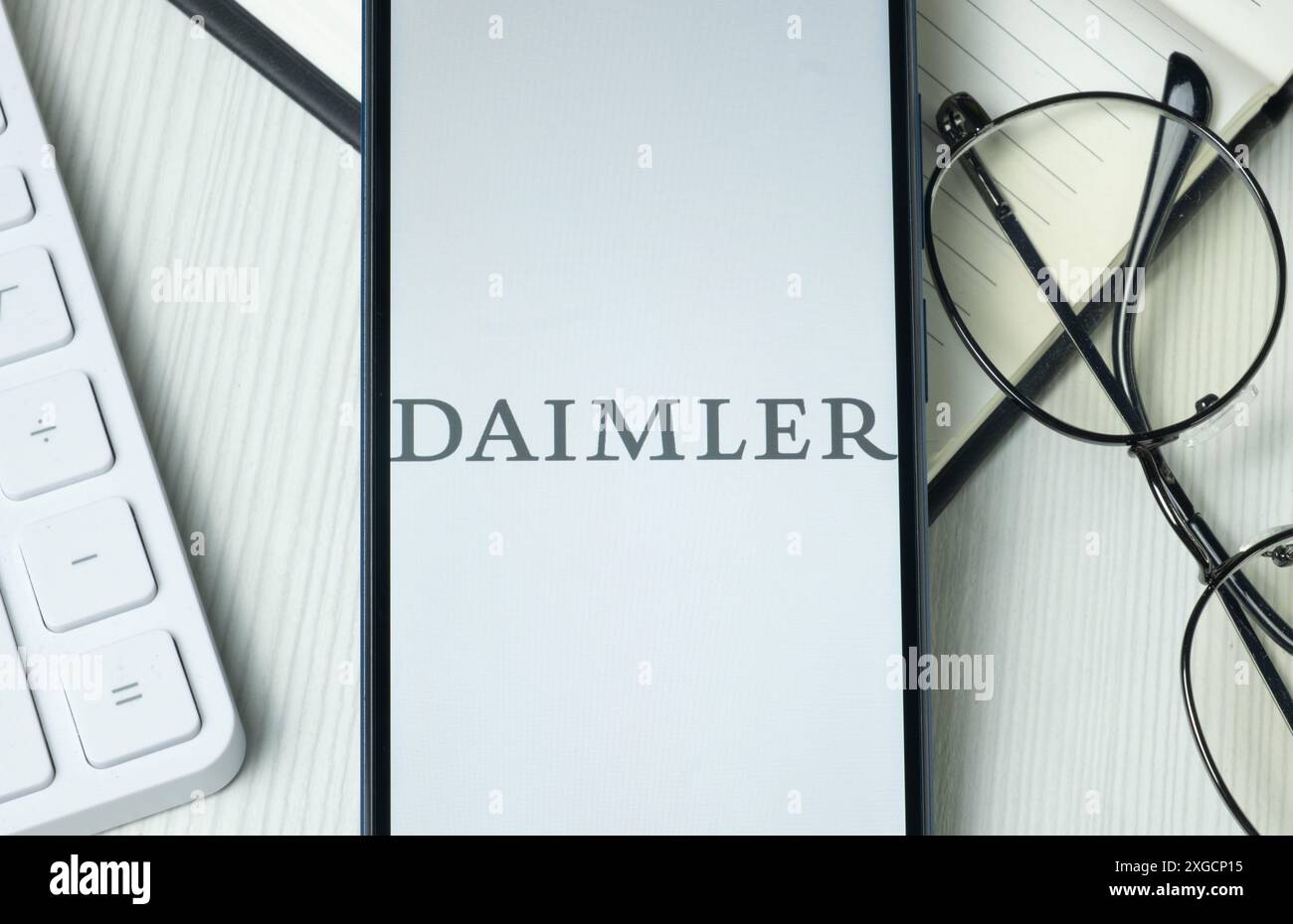 New York, USA - 21 June 2024: Daimler Logo on Phone Screen, Company Icon. Stock Photo