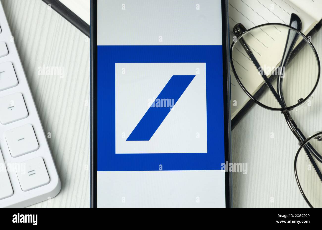 New York, USA - 21 June 2024: Deutsche Bank Logo on Phone Screen, Company Icon. Stock Photo