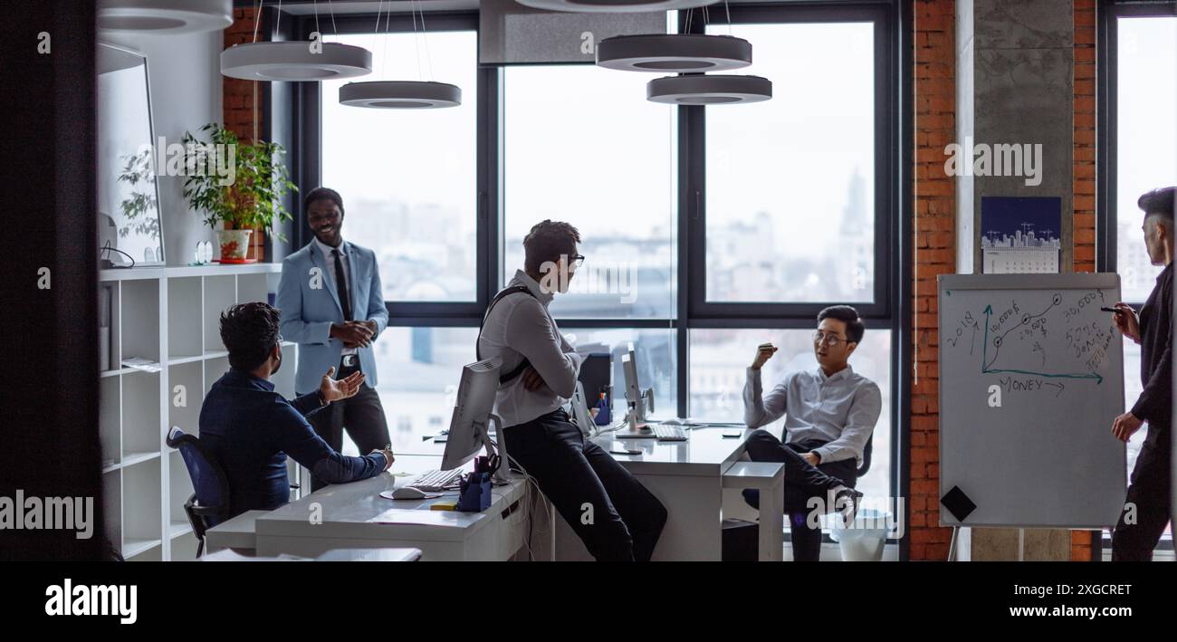 Group indian software developers discussing hi-res stock photography ...
