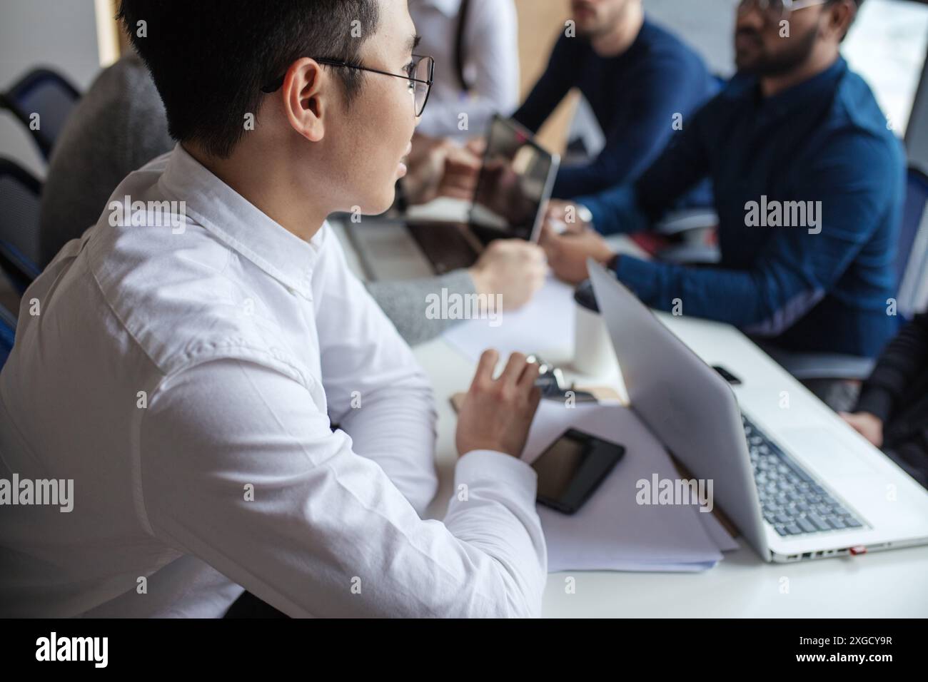 Students group laptop working close up hi-res stock photography 