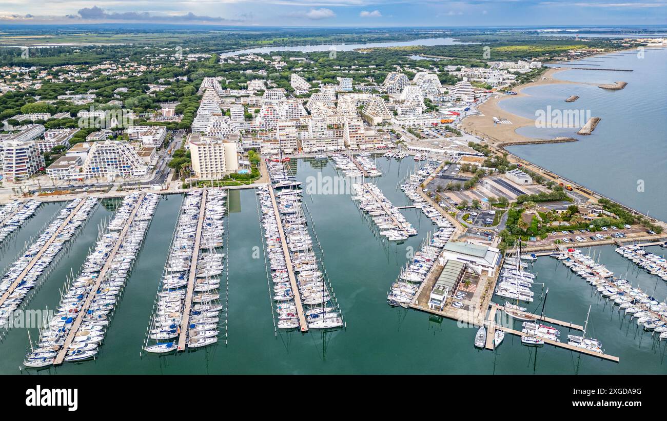 Aerial of the sport harbour, futuristic seaside town of La Grande Motte, Herault, Occitania, France, Europe Stock Photo