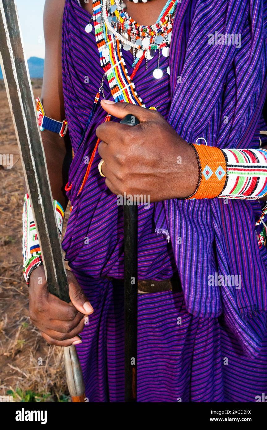 Masai in the bush, hands with spear and rungu, Mwatate, Lualenyi Ranch