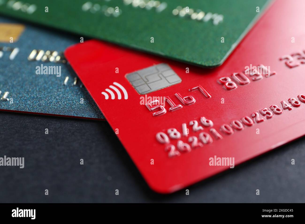Different credit cards on black background, closeup Stock Photo - Alamy