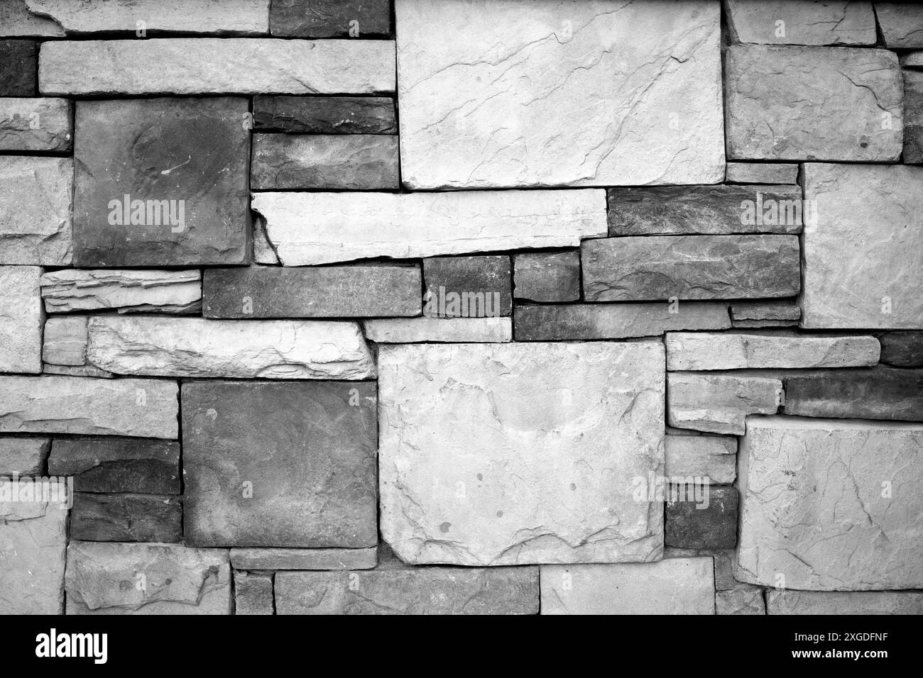 MT00577-00-BW...MONTANA - Rock wall in the town of Gardiner, the North entrance to Yellowstone National Park. Stock Photo