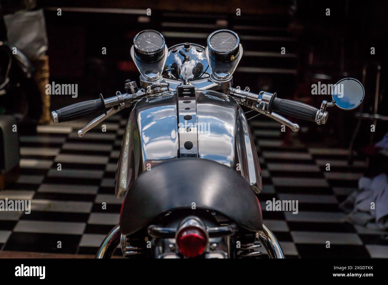 Motorbikes and bike paraphernalia in a garage Stock Photo