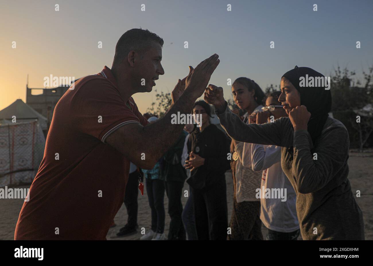 Gaza. 5th July, 2024. Palestinian girls attend boxing training in the refugee camp in Mawasi of Khan Younis in the south of Gaza, on July 5, 2024. Credit: Rizek Abdeljawad/Xinhua/Alamy Live News Stock Photo