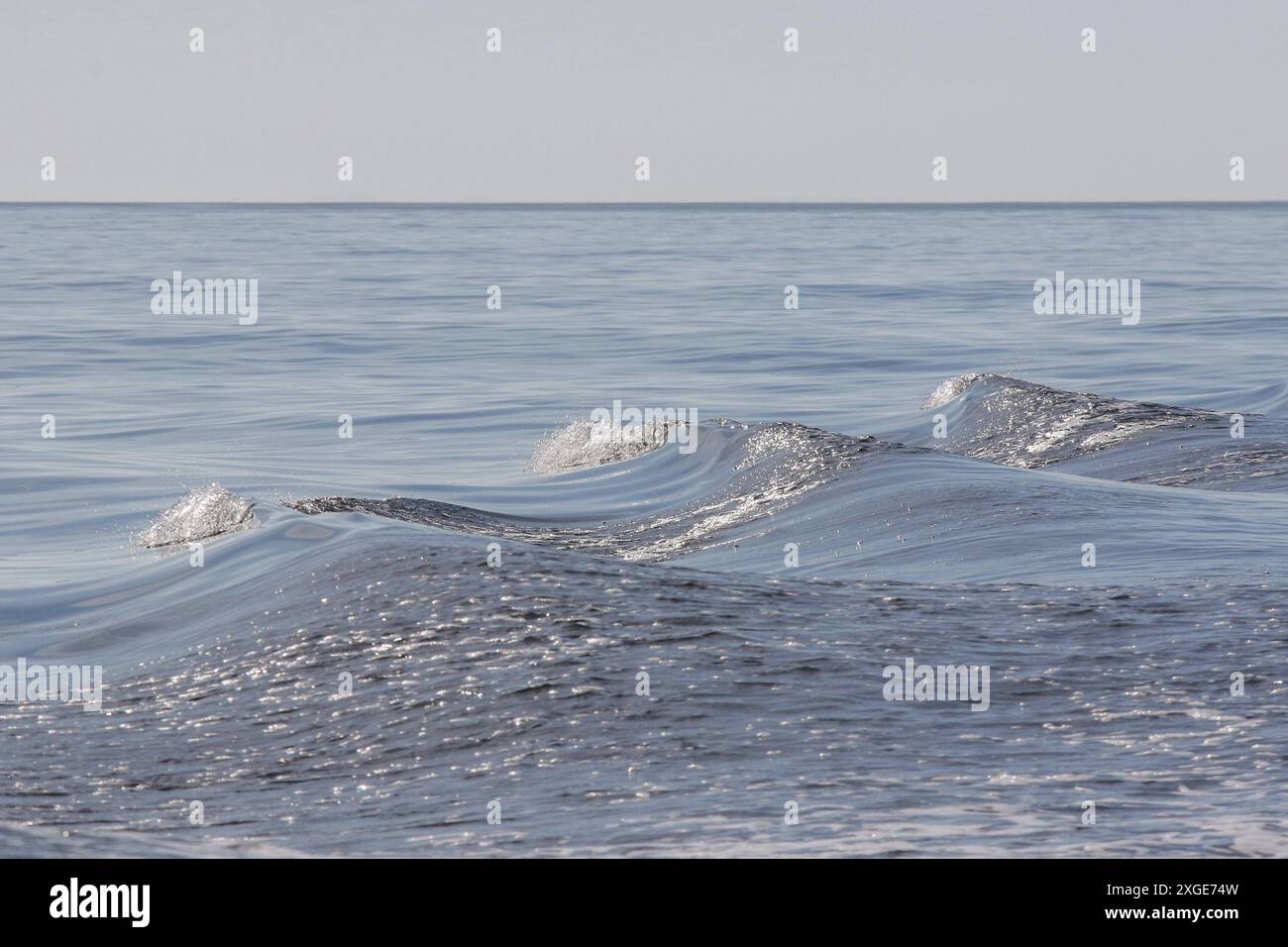 Waves from bow of motor boast coast of Ireland County Donegal. Stock Photo