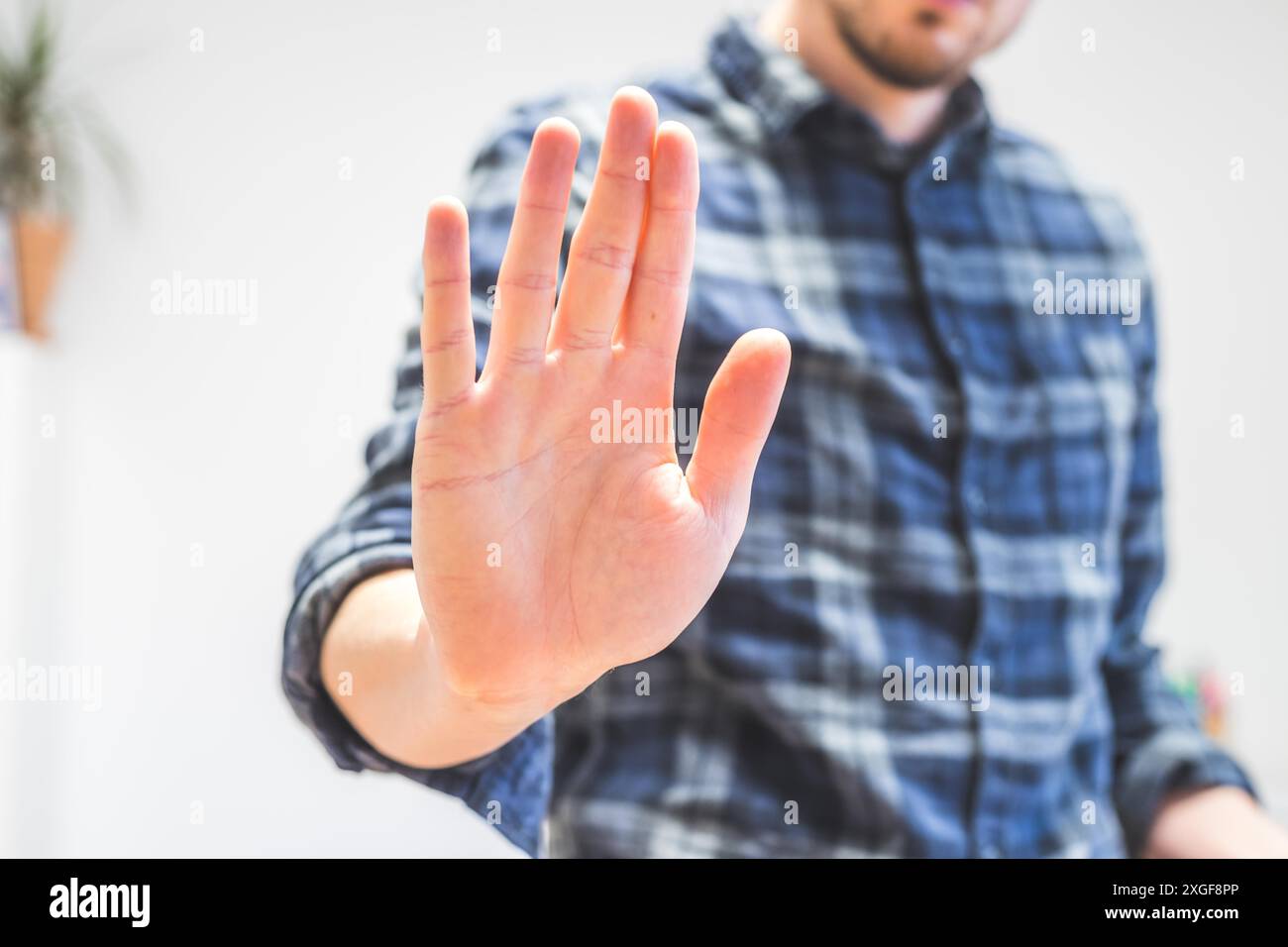 Man showing stop gesture, close up of the hand Stock Photo - Alamy