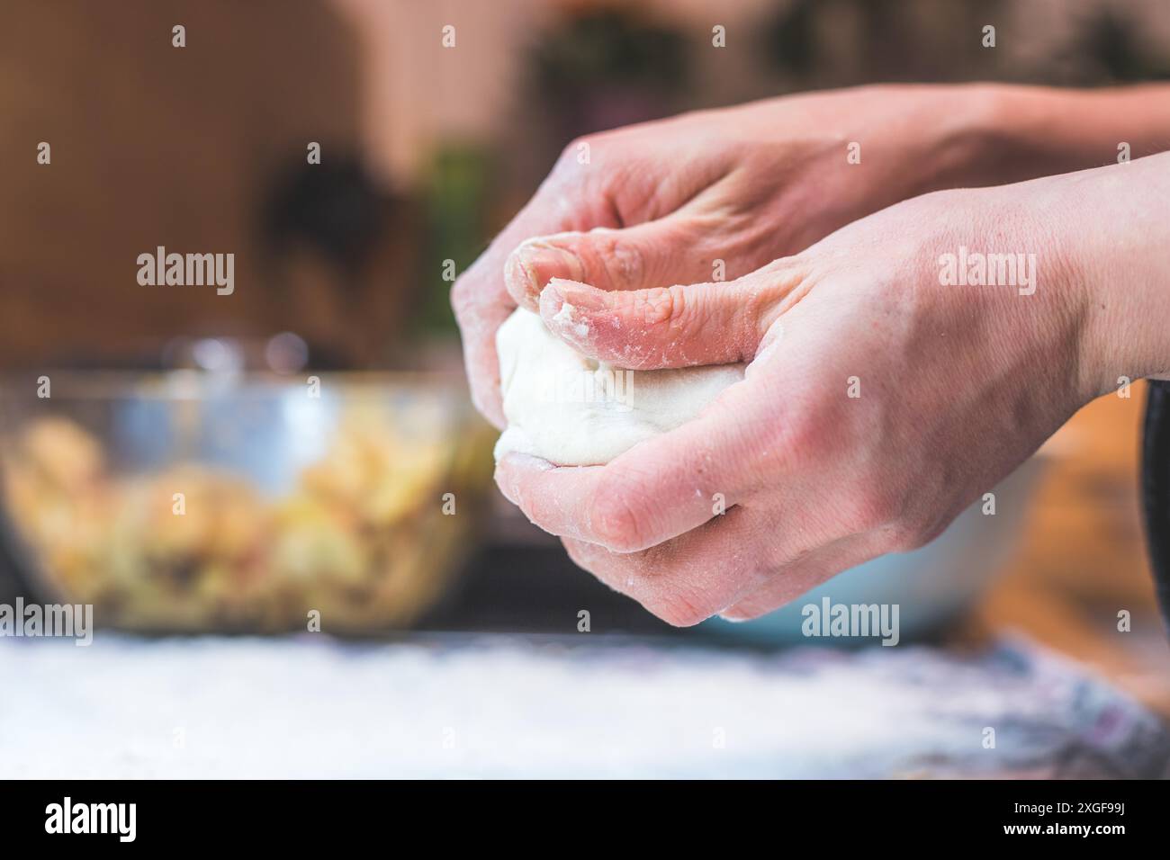 Woman kneading pizza dough in hi-res stock photography and images - Alamy