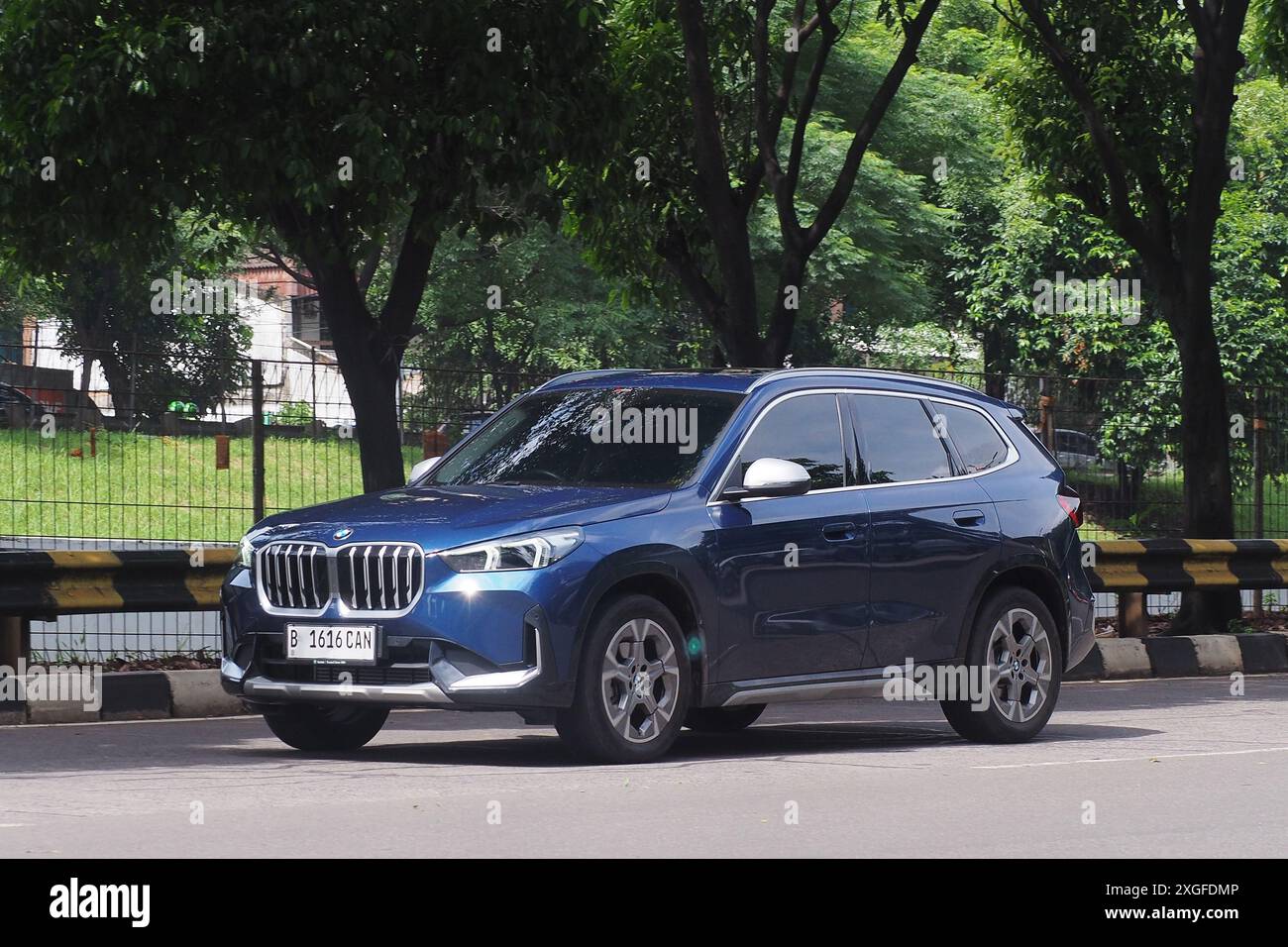 Dark Blue SUV car BMW X5, on the street, Jakarta, indonesia Stock Photo ...