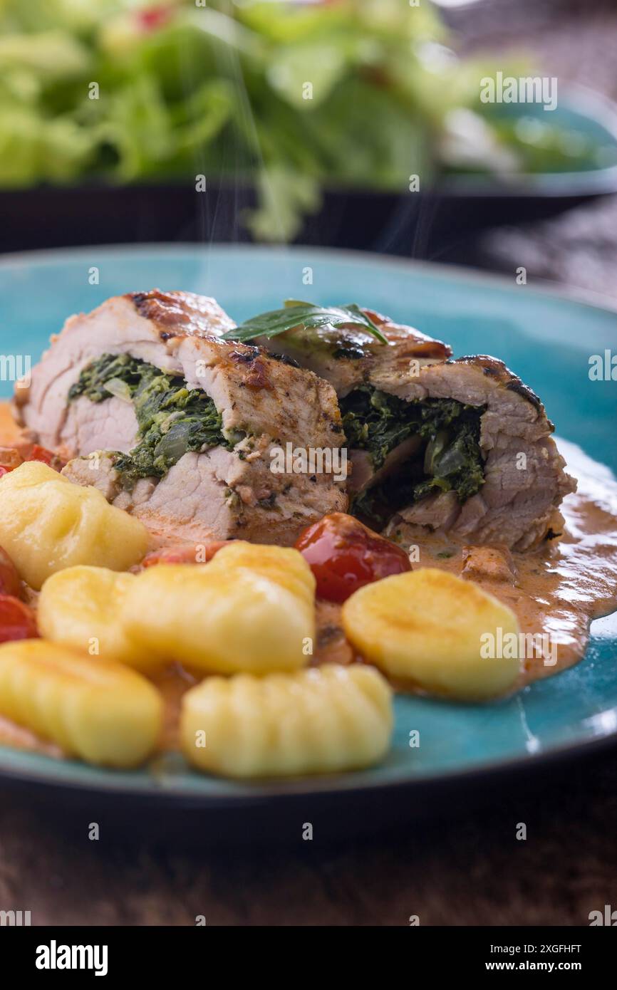 Pork fillet with gnocchi and cream sauce Stock Photo Alamy