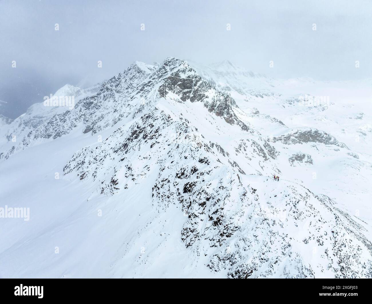 Aerial snowy misty mountain hi-res stock photography and images - Alamy
