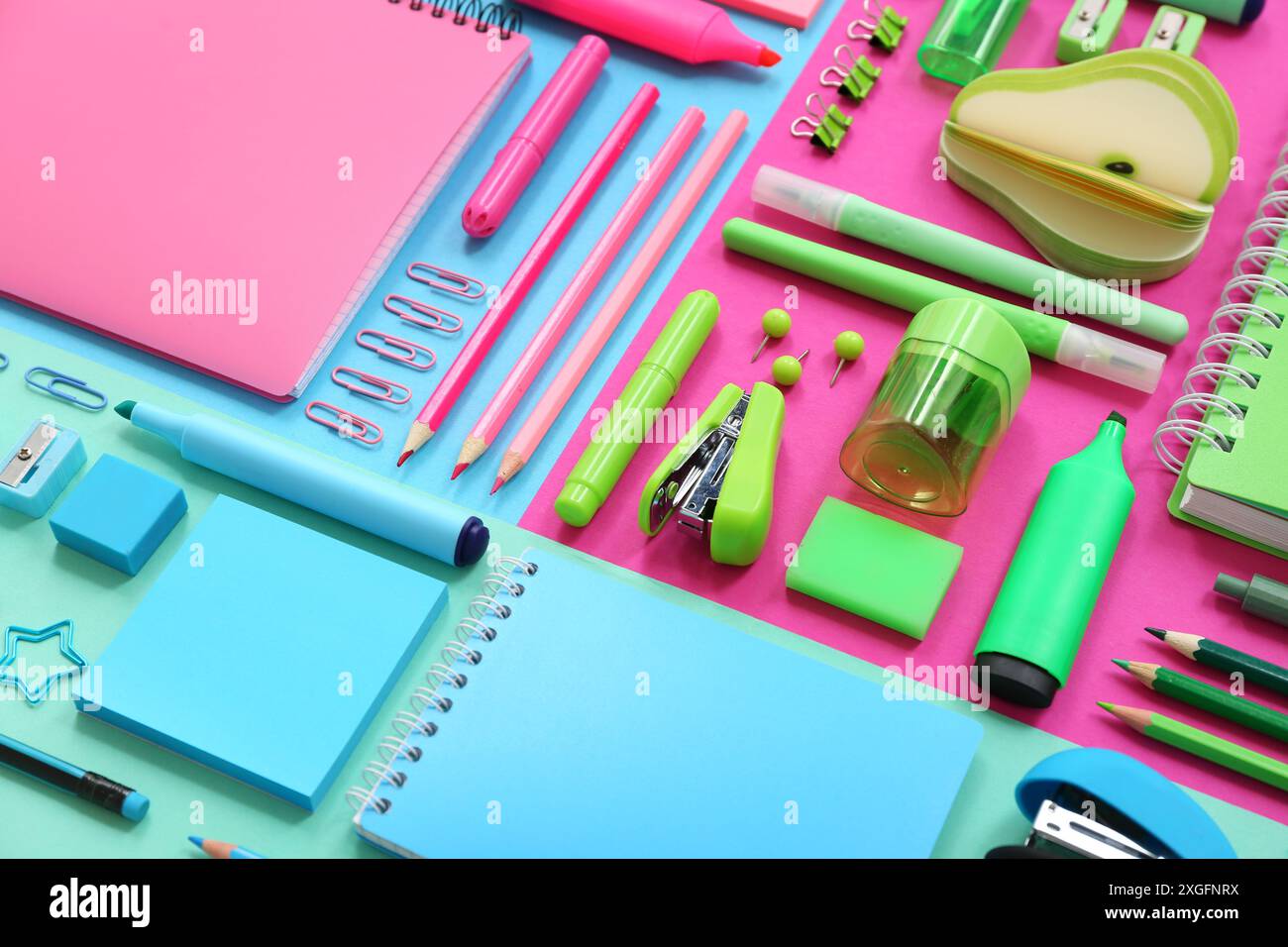 Composition with notebooks and different stationery on color background, closeup Stock Photo
