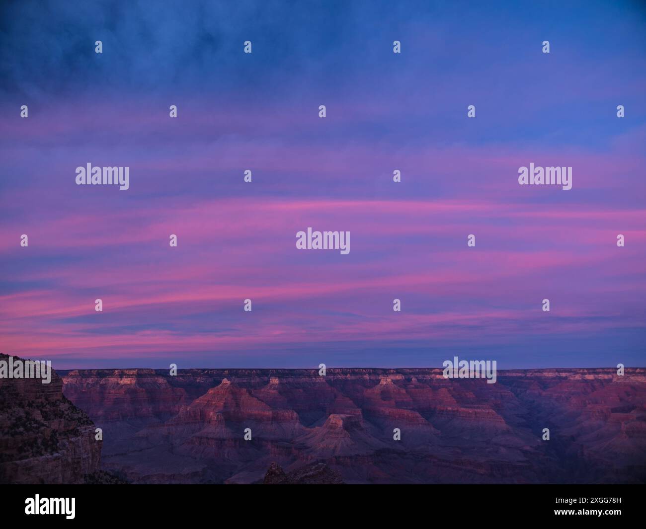 A colorful sunset sky over the Grand Canyon, Arizona Stock Photo