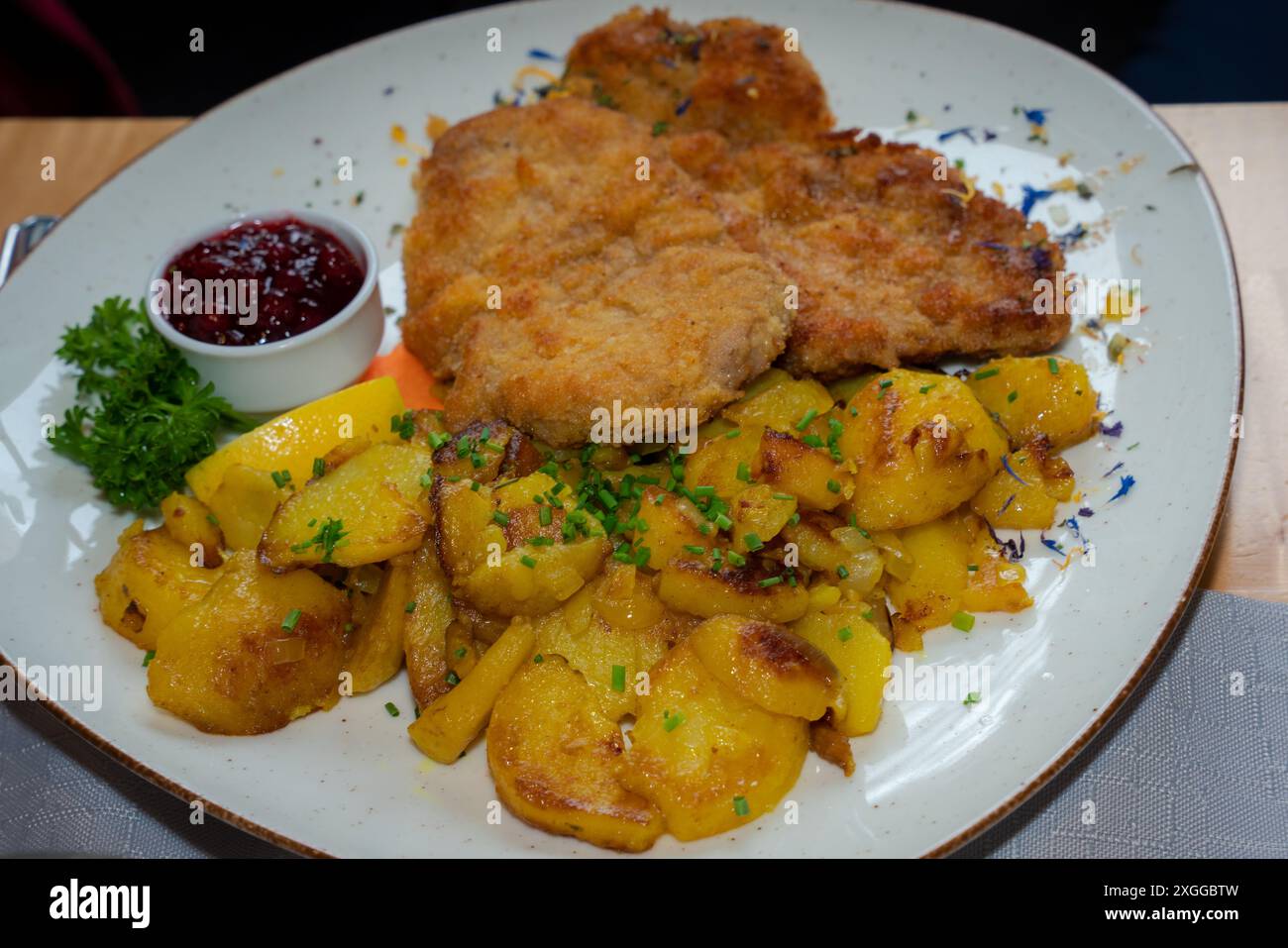 Schnitzel, Potatoes, Cranberry sauce, Bavarian cuisine, German food ...