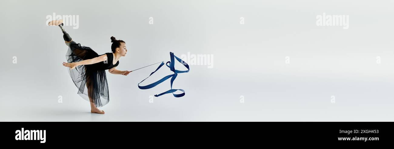 Prosethetic Ribbon A young girl with a prosthetic leg performs a graceful ribbon routine ...