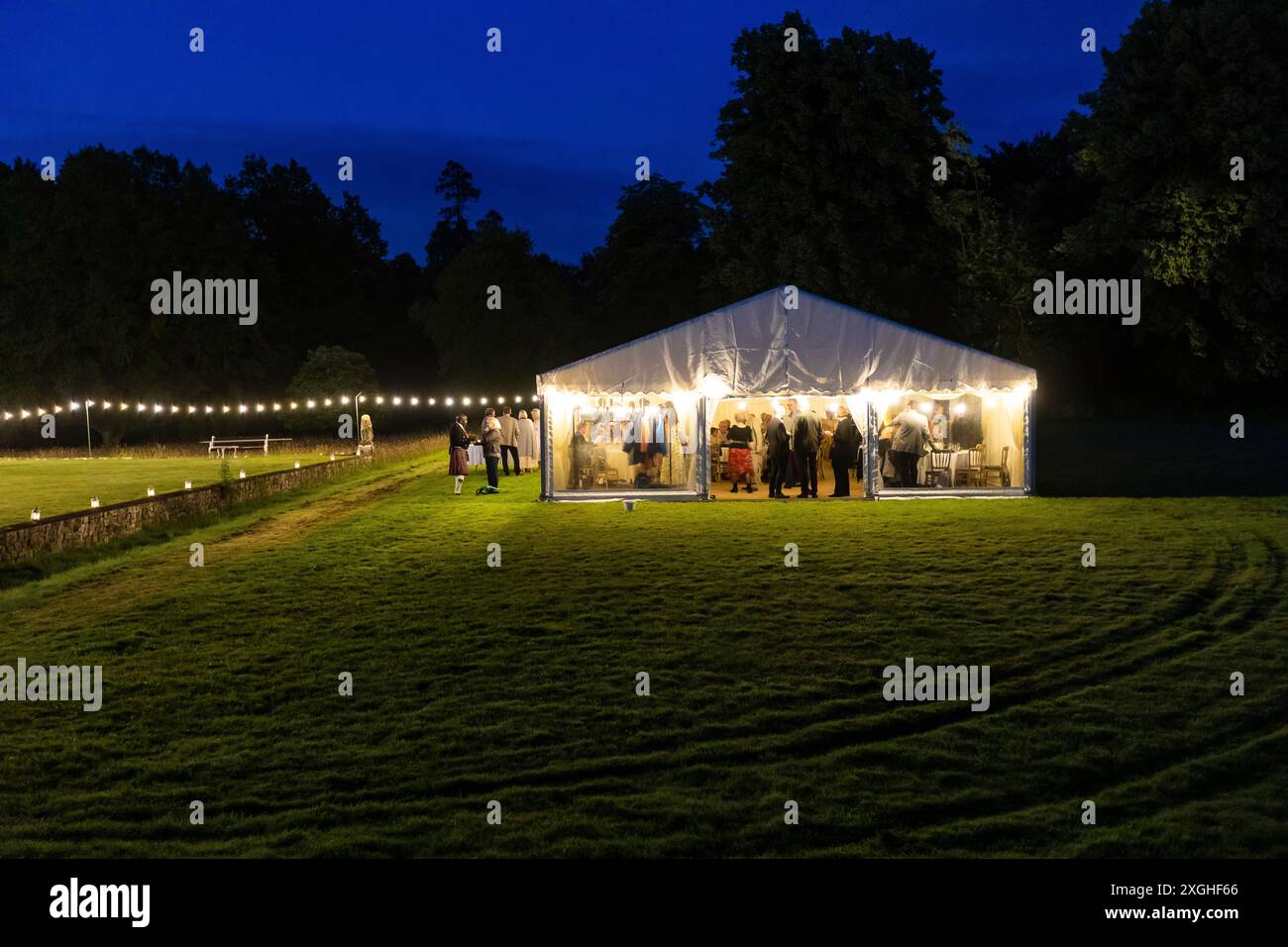 Marquee in the grounds of Chiddingstone Castle hosting a wedding reception, Chiddingstone, Kent Stock Photo