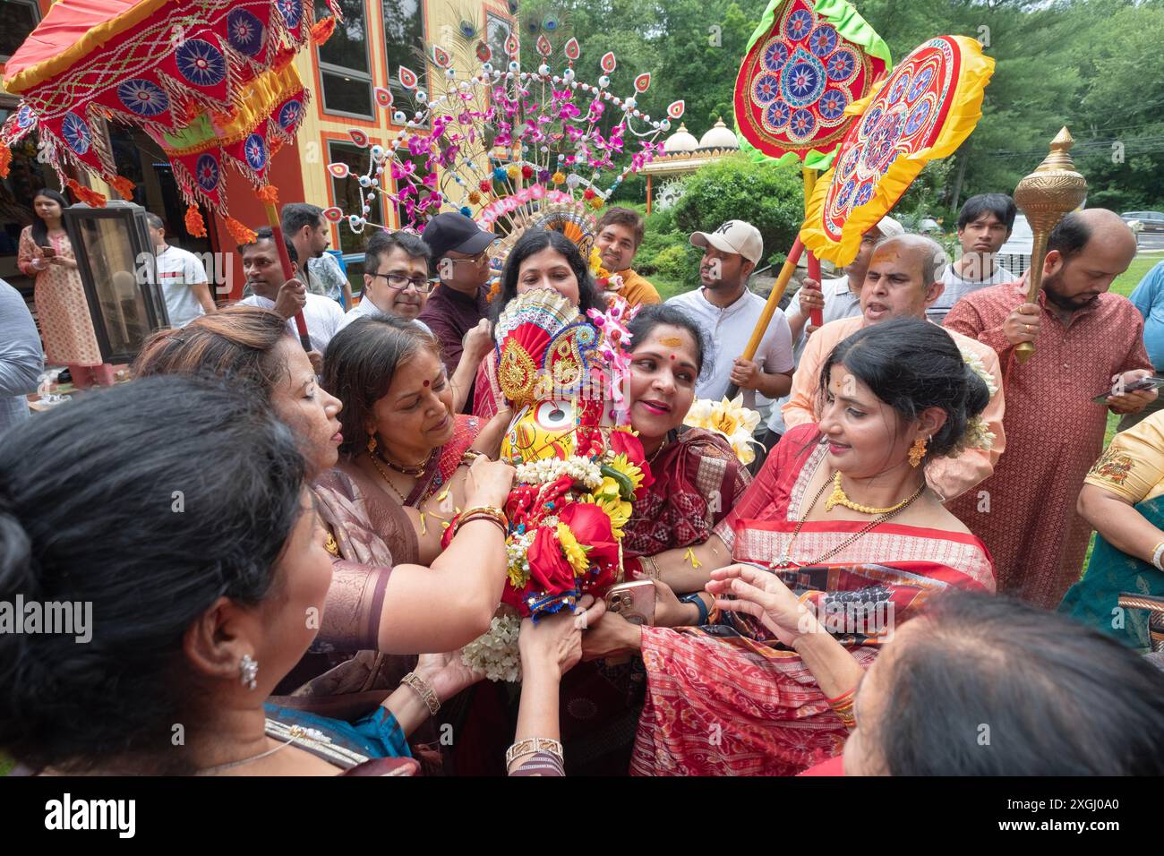 Before the Ratha Yatra Parade a group of devout men & women carry a statue of Subhadra a sister of Krishna. In Wilton, Connecticut, 2024. Stock Photo