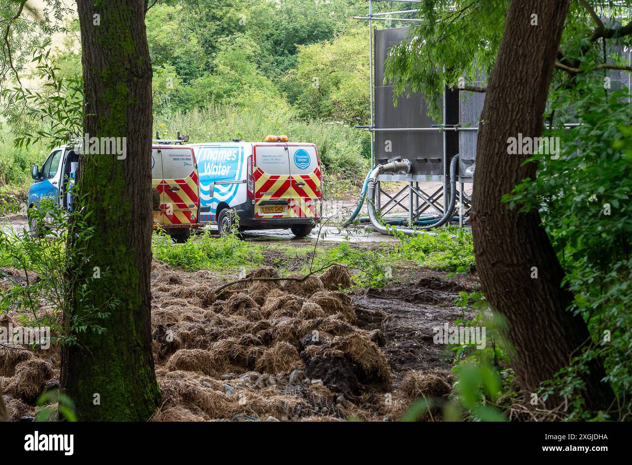 Amersham, UK. 9th July, 2024. Thames Water have been discharging from the Amersham Balancing Tanks into the River Misbourne for over 3,500 hours. They were discharging there again today. Downstream from the discharges, there is a stench of sewage from the River Misbourne in the village of Chalfont St Giles in Buckinghamshire. There is clear evidence of sewage fungus in the River Misbourne, a rare chalkstream, and along the banks. Thames Water has paid £158m to shareholders despite having a debt of £15 billion. Thames Water have said they will run out of cash by May 2025. Thames Water's CEO, Ch Stock Photo