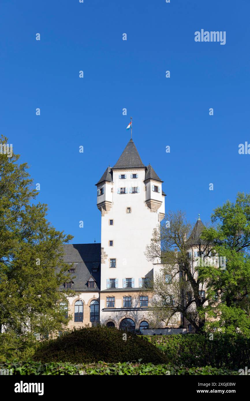 Europe, Luxembourg, Colmar-Berg, Berg Castle (The Grand Duke of Luxembourg's Principal Residence) set amongst Beautiful Gardens Stock Photo