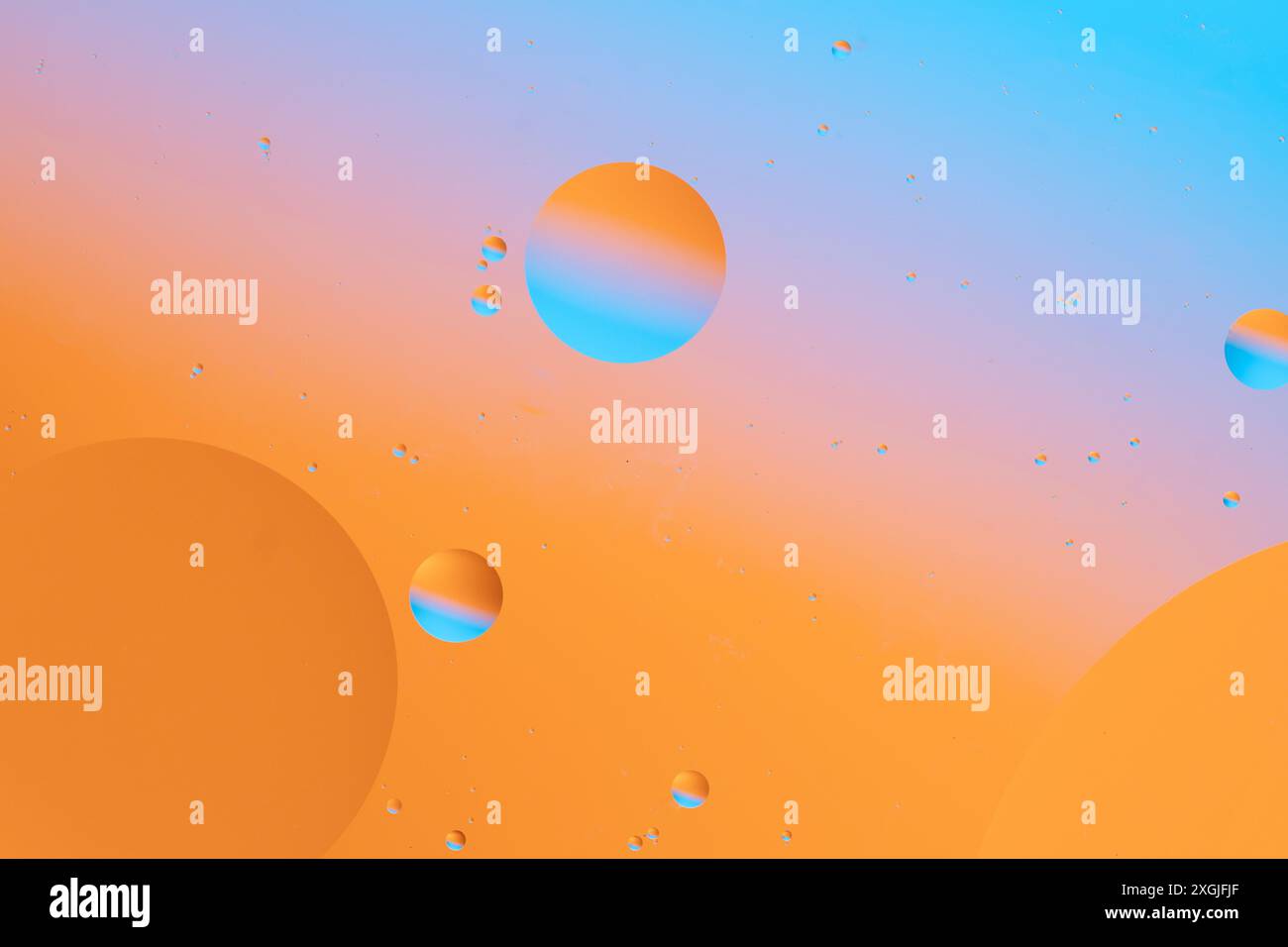 Blue and orange gradient spheres on abstract background Stock Photo