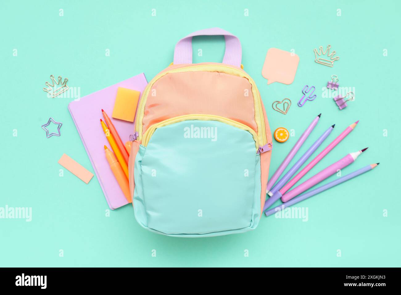 Composition with different stationery and stylish school backpack on color background Stock Photo