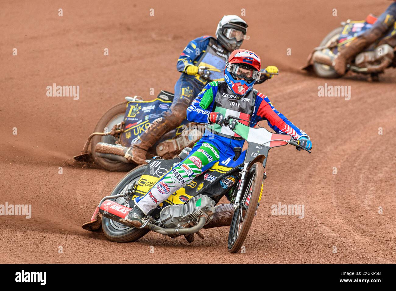 Paco Castagna of Italy in Red leading Stanislav Melnychuk of Ukraine in White during the Monster Energy FIM Speedway of Nations Semi-Final 1 at the National Speedway Stadium, Manchester on Tuesday 9th July 2024. (Photo: Ian Charles | MI News) Credit: MI News & Sport /Alamy Live News Stock Photo