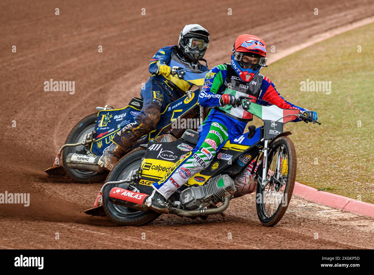 Italy v Ukraine: Paco Castagna of Italy in Red Stanislav Melnychuk of Ukraine in White leading during the Monster Energy FIM Speedway of Nations Semi-Final 1 at the National Speedway Stadium, Manchester on Tuesday 9th July 2024. (Photo: Ian Charles | MI News) Credit: MI News & Sport /Alamy Live News Stock Photo