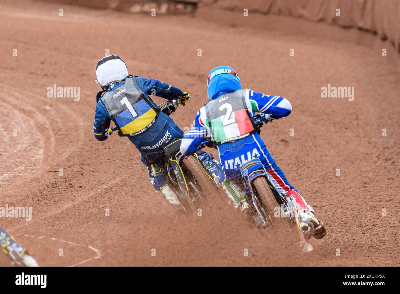 Nicolas Covatti of Italy in Blue chases Stanislav Melnychuk of Ukraine in White during the Monster Energy FIM Speedway of Nations Semi-Final 1 at the National Speedway Stadium, Manchester on Tuesday 9th July 2024. (Photo: Ian Charles | MI News) Credit: MI News & Sport /Alamy Live News Stock Photo