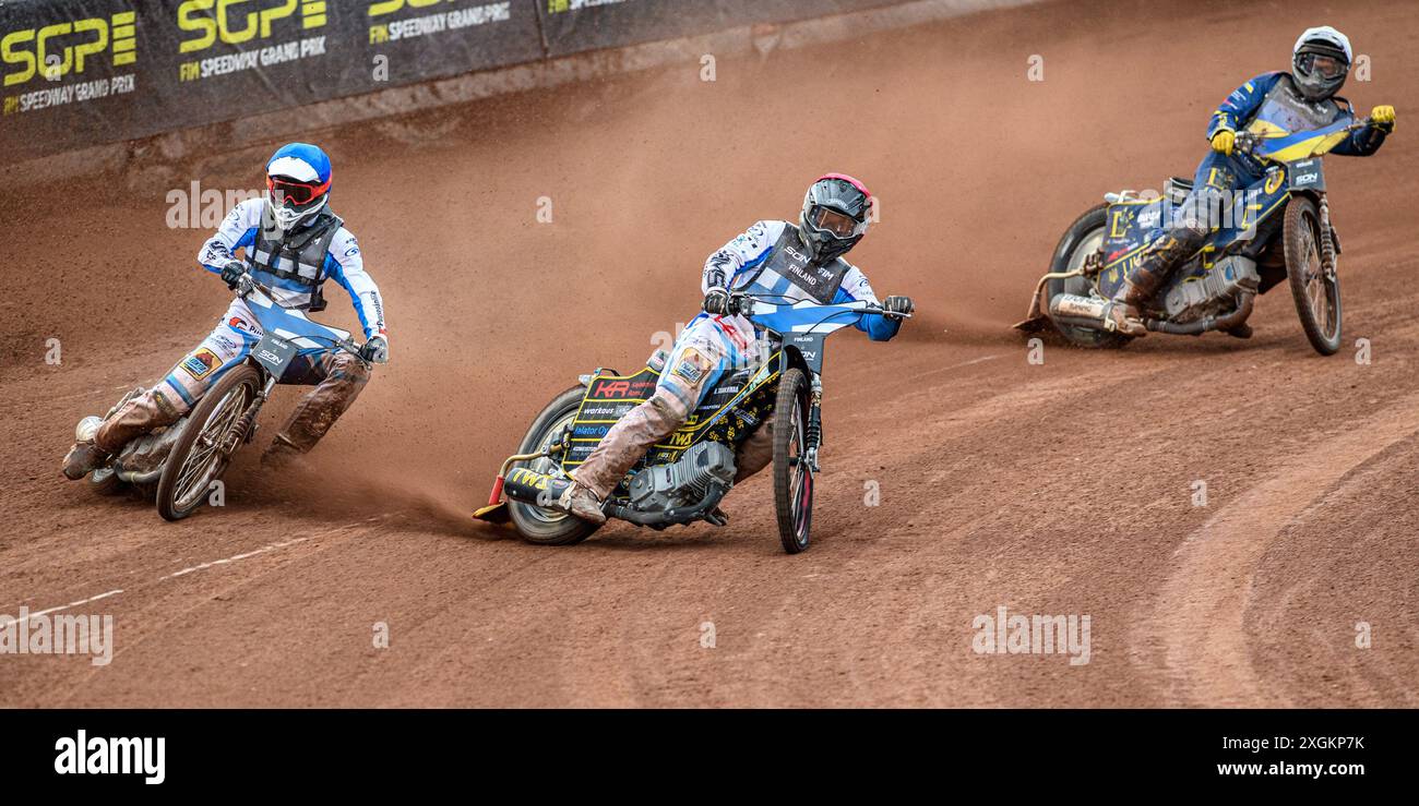 Finland v Ukraine: Jesse Mustonen of Finland in Red and Antti Vuolas of Finland in Blue leading Stanislav Melnychuk of Ukraine in White during the Monster Energy FIM Speedway of Nations Semi-Final 1 at the National Speedway Stadium, Manchester on Tuesday 9th July 2024. (Photo: Ian Charles | MI News) Credit: MI News & Sport /Alamy Live News Stock Photo