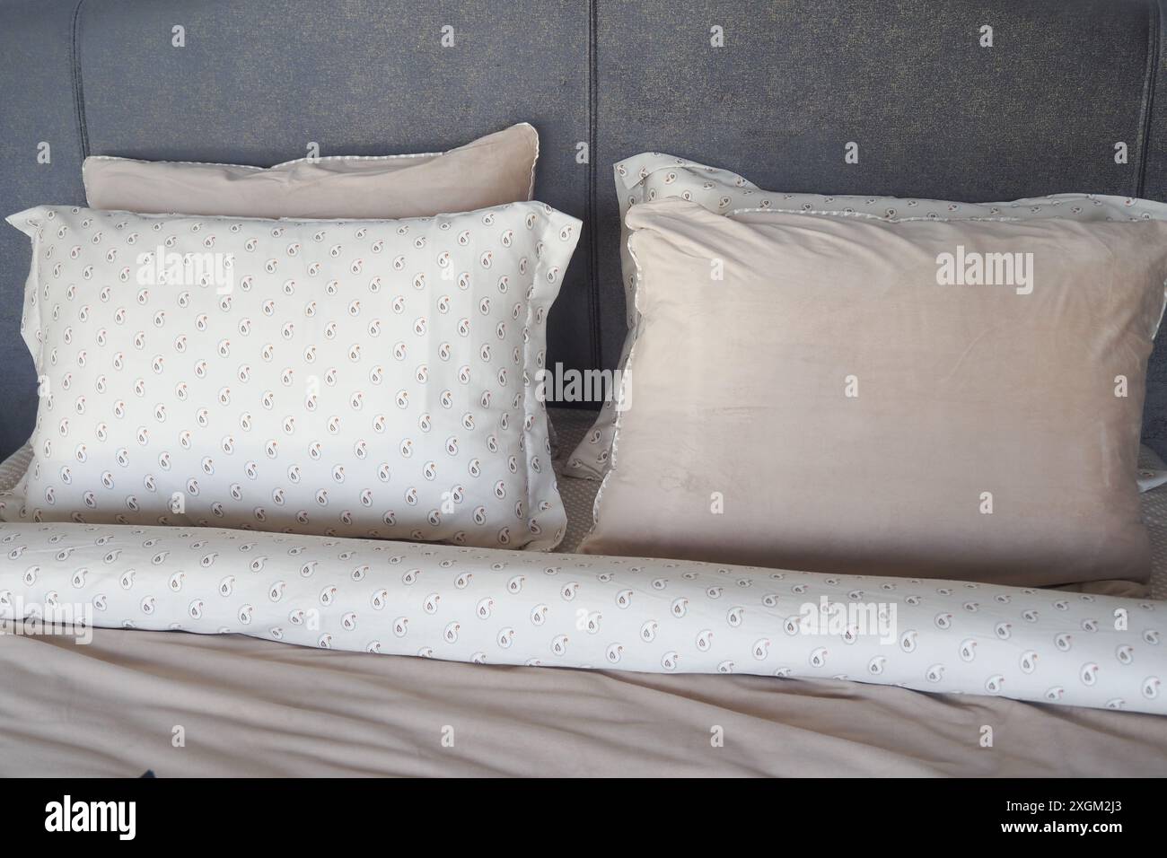 white pillow lined up on bed  Stock Photo
