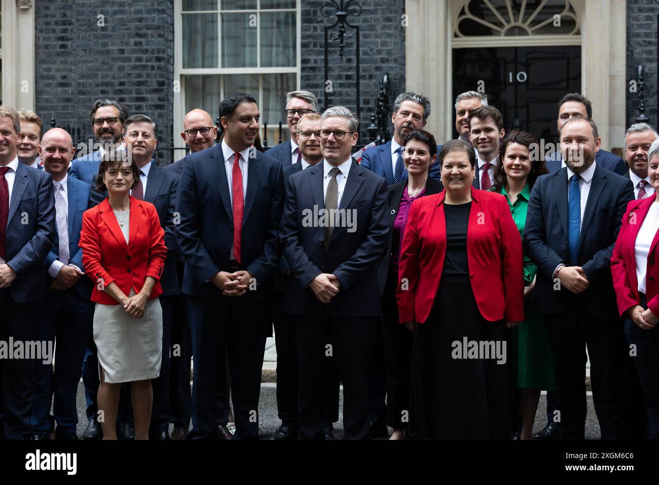 London, UK. 09th July, 2024. Prime Minister Keir Starmer (L) poses with Scottish Labour Leader Anas Sarwar (C) and new Scottish Labour MPs outside 10 Downing Street, London. New MPs are expected to be sworn into Parliament after the last week's General Election which was won by Labour in a landslide victory. Credit: SOPA Images Limited/Alamy Live News Stock Photo