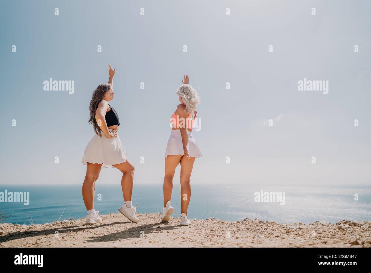 Two women pose photo hi-res stock photography and images - Alamy
