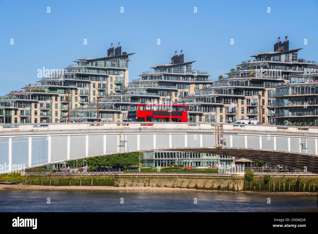 Wandsworth bridge with riverside development Battersea Reach in the background in London Stock Photo