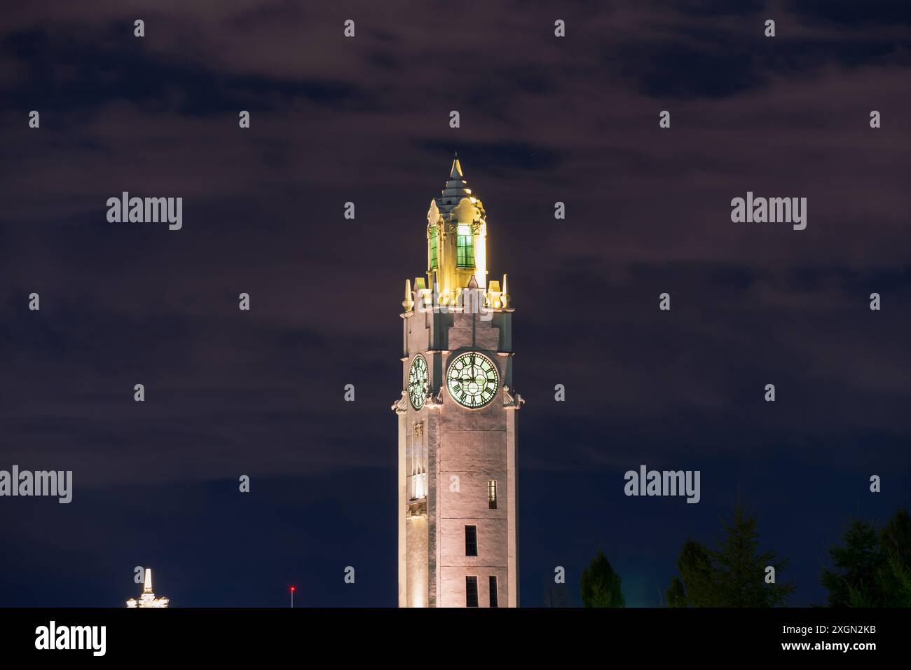 Old Port of Montreal Clock Tower illuminated at night. Montreal, Quebec, Canada. Stock Photo