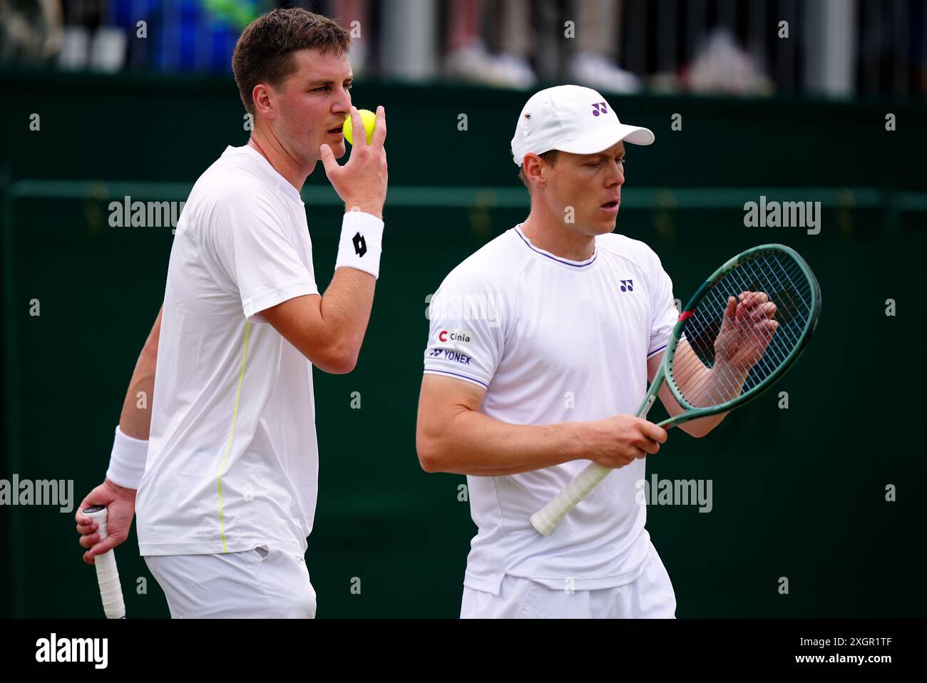 Henry Patten and Harri Heliovaara (right) during their doubles match on ...