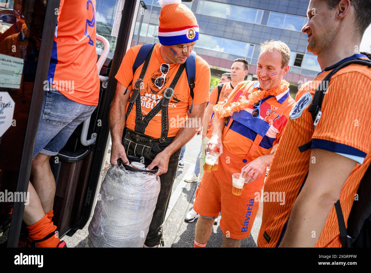 ENSCHEDE - Dutch fans board the bus on the day of the semi-final at the ...
