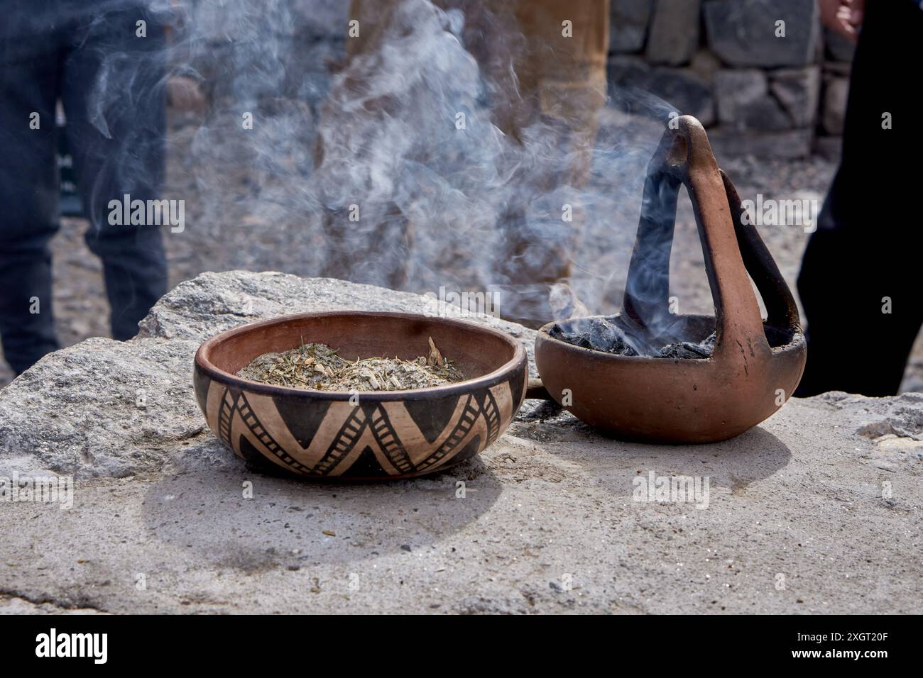 offering coca leaf, payment to Pachamama in Argentina. Ritual with ...