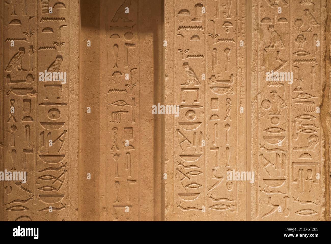 ancient stone wall with Egyptian ornament carving Stock Photo - Alamy