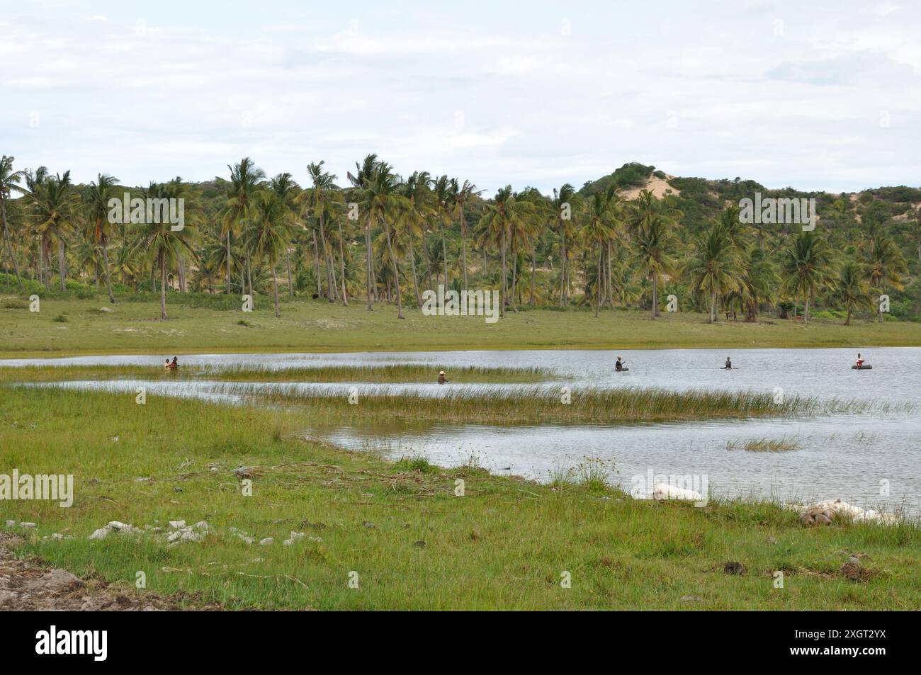 Fresh water lake, Ligogo, Inhambane,   Mozambique - people in small boats on lake Stock Photo