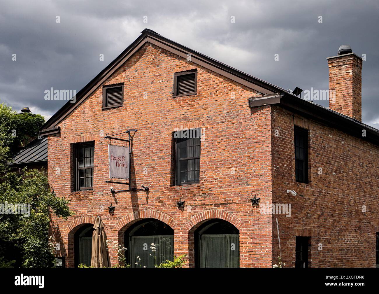 Hudson, NY - May 29, 2024: feast and floret restaurant facade in downtown Hudson, New York. Stock Photo