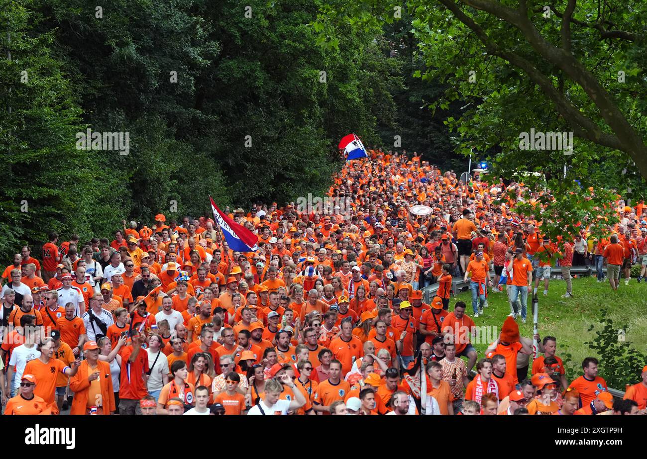 The Netherlands fans make their way to the stadium ahead of the UEFA ...