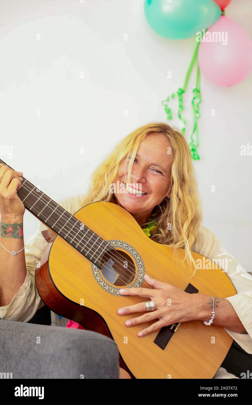 Celebratory smiles hi-res stock photography and images - Alamy