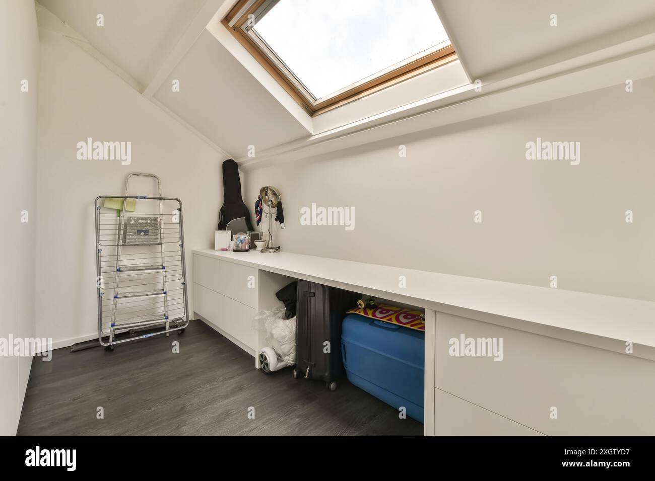 This attic workspace located in Hilversumstraat, Amsterdam features a ...