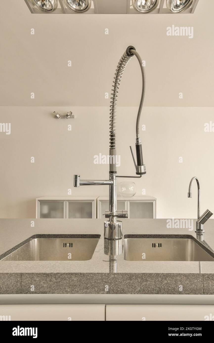 A sleek and contemporary kitchen design featuring a professional-grade ...